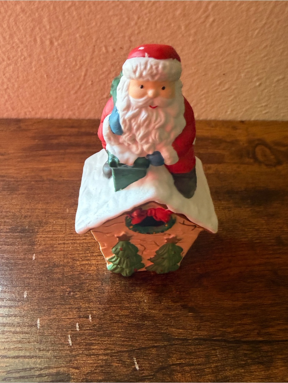 Vintage festive Santa on Snowy House Holiday Figurine - Red